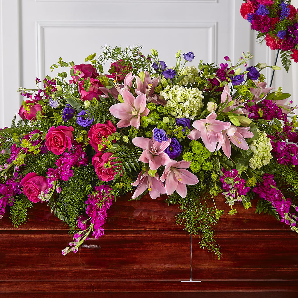 Radiant Tribute Casket Spray – The Flower Place, Bradenton FL