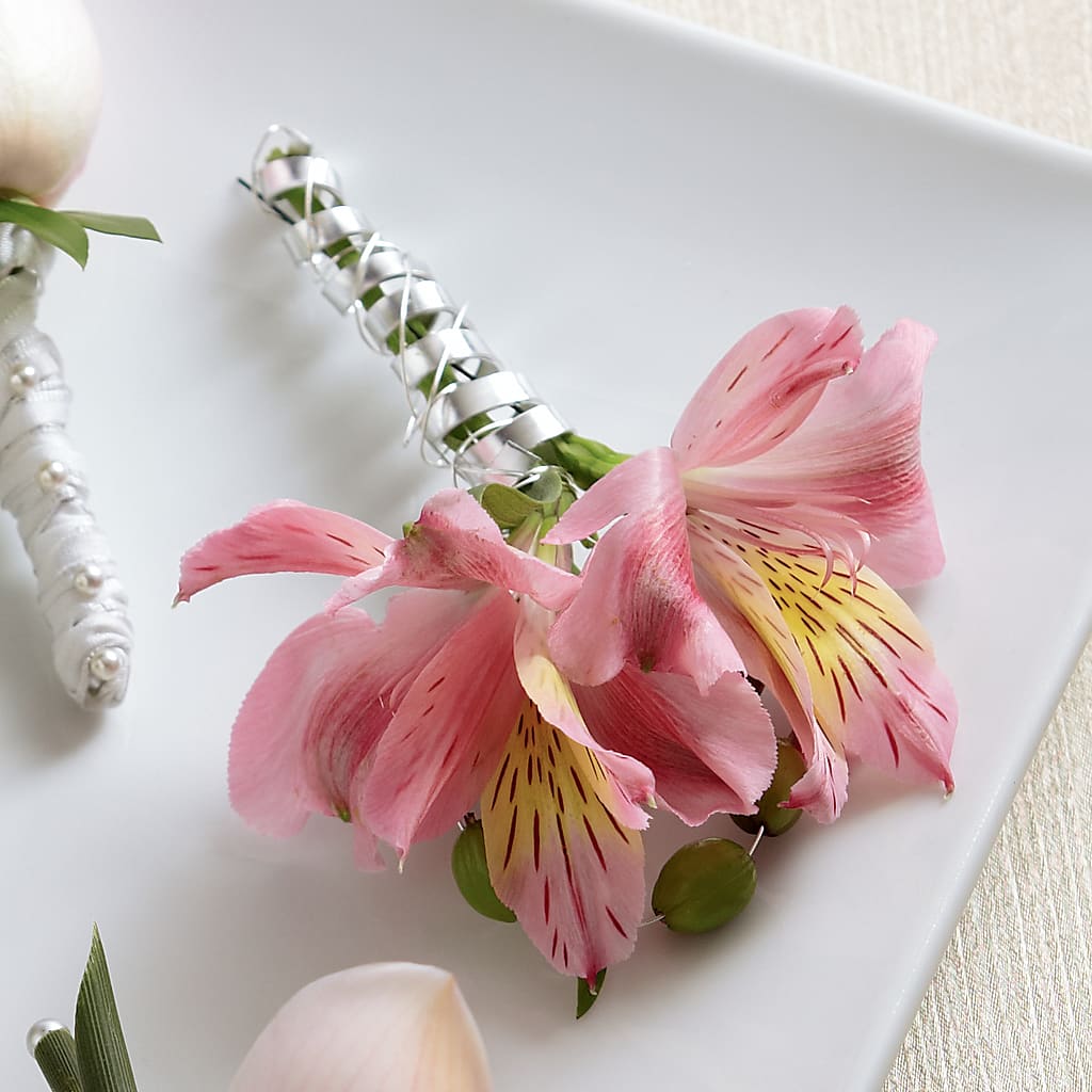 Pink Peruvian Lily Boutonniere – The Flower Place, Bradenton FL