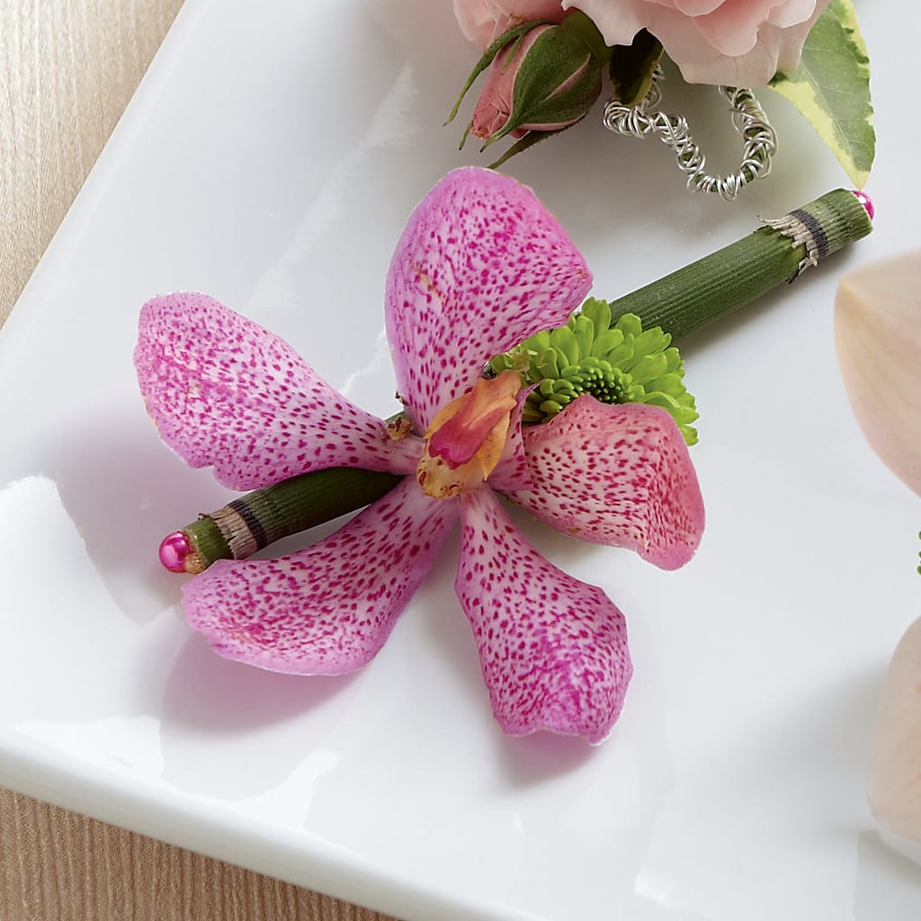 Pink Mokara Boutonniere – The Flower Place, Bradenton FL