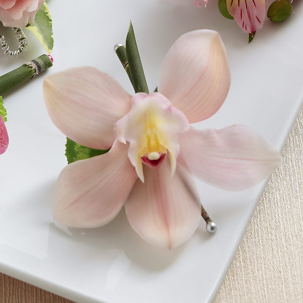 Pink Cymbidium Boutonniere – The Flower Place, Bradenton FL